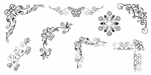 Collection of elegant black and white floral swirl ornaments and corner flourishes