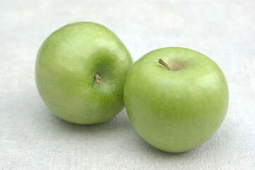 green apples on a white background