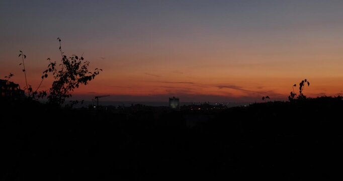 Istanbul Skyline at Dusk with Red-Tinted Sky over Harem Coast