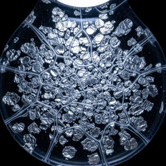 Abstract of Metallic Boron Powder Flakes Suspended in Clear Viscous Polymer Resin