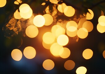 Golden lights bokeh through leaves