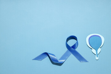 Blue ribbon and bladder icon represent prostate cancer awareness