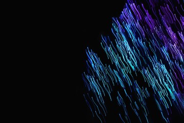 Abstract blurred light on the black background