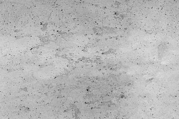 Light gray concrete texture featuring a subtle, rough surface with speckled grit and industrial imperfections. This modern background is ideal for minimalist, urban, and grunge design projects.