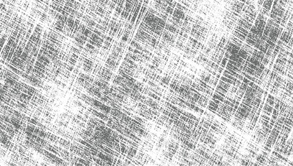 Obraz premium A monochromatic texture of gray and white crisscrossing lines and marks creating a distressed surface.