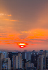 Obraz premium Aerail View of Gurgaon,Haryana,India at sunset.Gurugram city skyline with urban,modern architecture,design. Luxury residential apartments,commercial buildings of HNI in Delhi NCR.