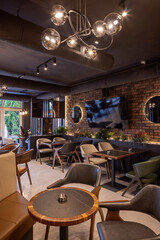 Modern hotel dining room prepared for guests