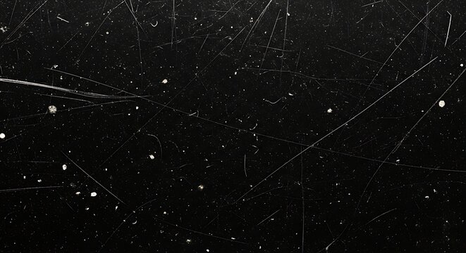 Dark textured background with scratches and dust particles for design use