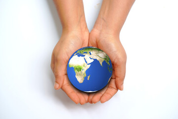 Hands holding the earth on white background.