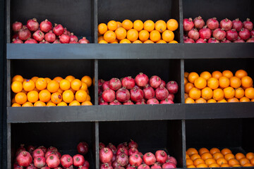 A set of vitamins. A boxes  with apples and pomegranates