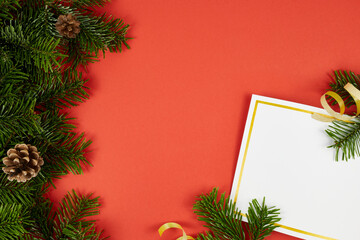 christmas greeting card background with fir tree decorations