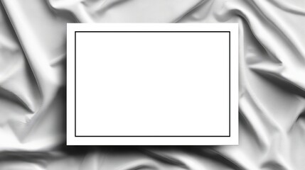 Blank white rectangle frame on draped fabric