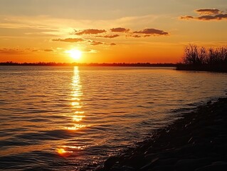 Golden sunset over calm river