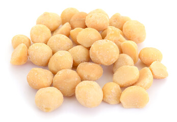 Roasted salted macadamia nuts isolated on white background