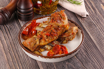 Baked lamb ribs with vegetables