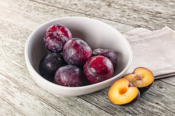 Ripe sweet juicy plum heap