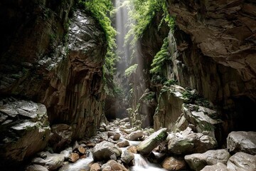 Fototapeta premium Sunlit gorge view with river, moss, and rocky walls