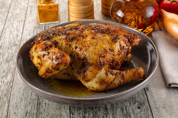 Baked in oven whole chicken with spices