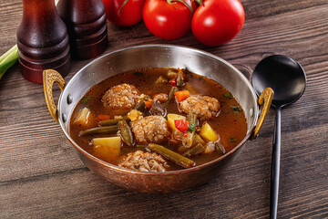 Tomato Soup with meatballs and vegetables