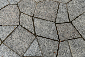 Close-up view of irregularly shaped stone pavement
