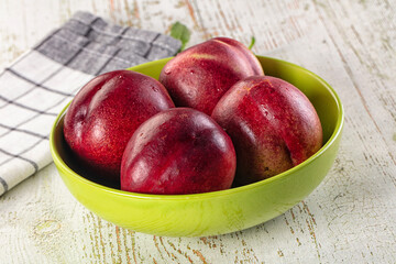 Ripe sweet juicy nectarines heap