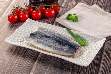 Salted herring fillet with skin