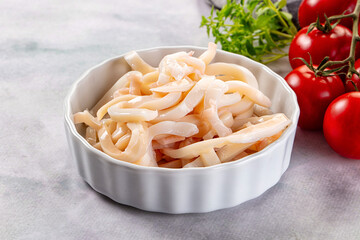 Canned marinated squid rings heap