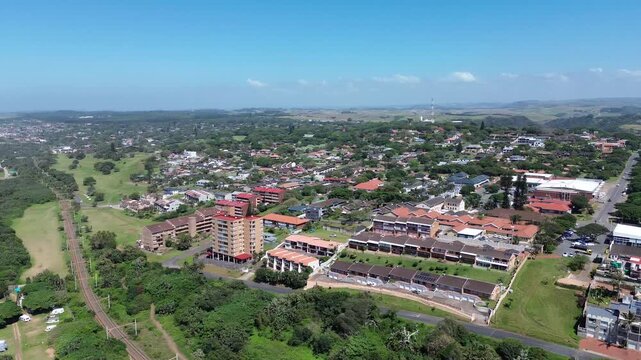 Camera panning left to right over the coastal town of Scottburgh on the South Coast of KwaZulu-Natal, Aerial 4K video.