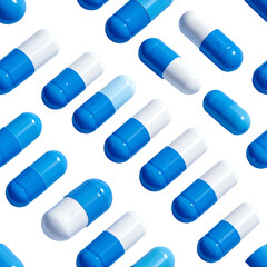 Isometric view of scattered blue and white capsule pills on a black backdrop