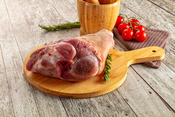 Raw pork knuckle over board
