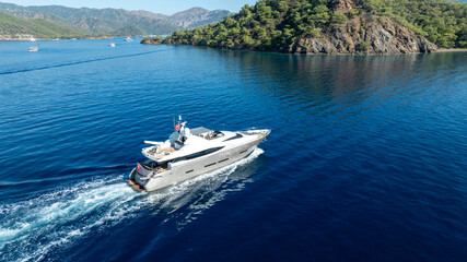 Fototapeta premium A private yacht cruising on calm waters