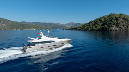 Fototapeta premium A private yacht cruising on calm waters