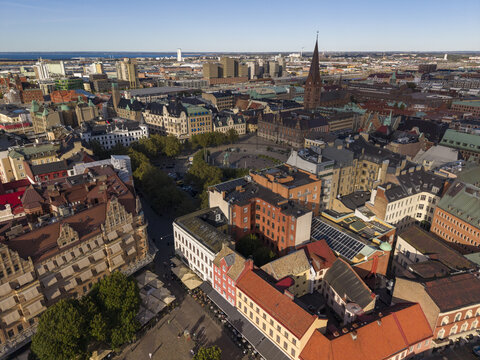 Aerial view of Stortorget's vibrant square, with its mix of modern and historic buildings, captured in a breathtaking panorama, Malmo, Sweden.
