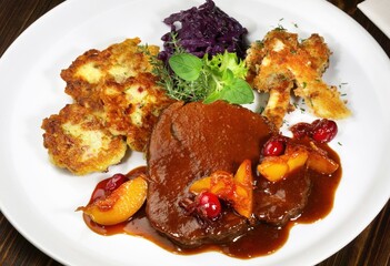 Roasted Deer with Potato - caramelized Cranberries  and Apricots