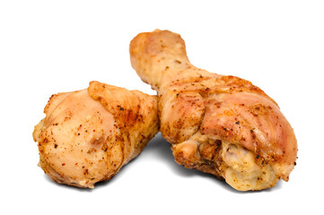 Baked homemade drumsticks, chicken legs with golden skin close-up