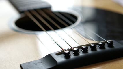Fototapeta premium acoustic guitar macro abstract , Used to play music and notes