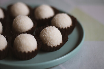 Traditional Catalan coconut panellets, homemade sweets on plate