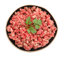 Fresh raw minced meat with parsley in bowl isolated on white, top view