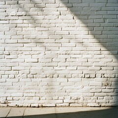 White brick wall with sun shadows