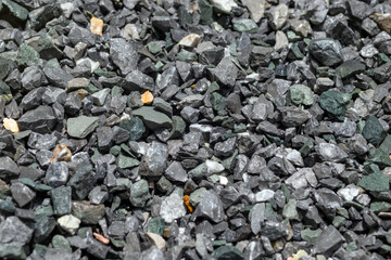Construction stones used for cement mixing, Rock, Stone pile, Ideal for illustrating engineering or infrastructure projects