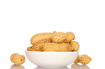Unshelled peanuts isolated on white background, macro.	