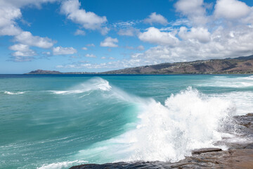 Maunalua Bay.China Walls / Koko Kai Beach Mini Park, East Honolulu, Oahu, Hawaii. Pacific Ocean. In the distance is Koʻolau Range(windward shield volcano)
