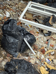 Rubble Industrial waste from a house DIY renovation project bin bags bricks broken tiles
