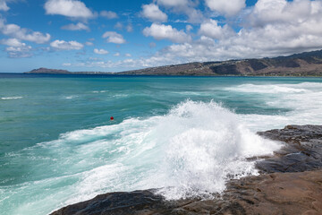 Maunalua Bay.China Walls / Koko Kai Beach Mini Park, East Honolulu, Oahu, Hawaii. Pacific Ocean. In the distance is Koʻolau Range(windward shield volcano)
