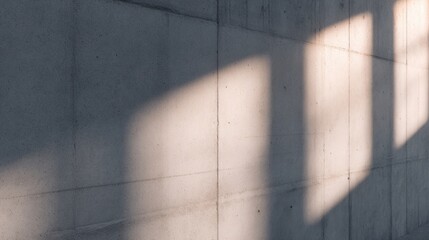Abstract play of light and shadow on a textured concrete wall, creating a serene atmosphere