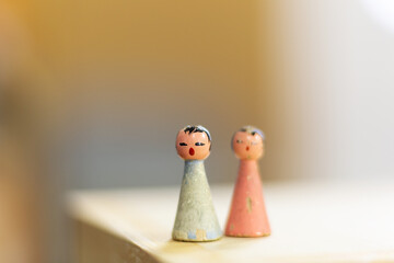 Two little dolls. Retro toys, with space for your logo or text.