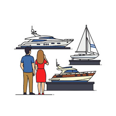 People looking at boats on display, including a yacht and a sailboat.