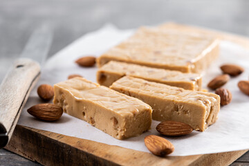 Christmas soft almond nougat on wooden table