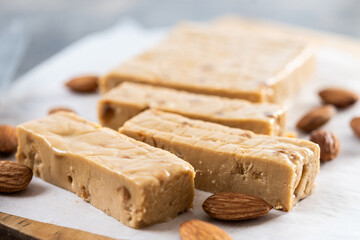 Christmas soft almond nougat on wooden table