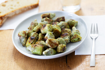 fried baby artichokes on plate